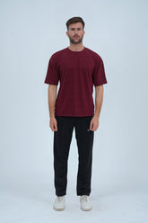 Essential maroon drop shoulder T-shirt for unisex oversized fit, premium cotton, and a modern street style look.